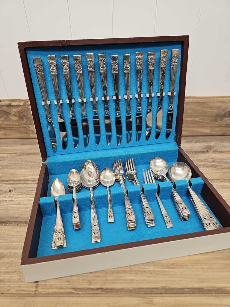 Vintage 52-piece "Community" flatware set in painted original box w/blue velvet lining