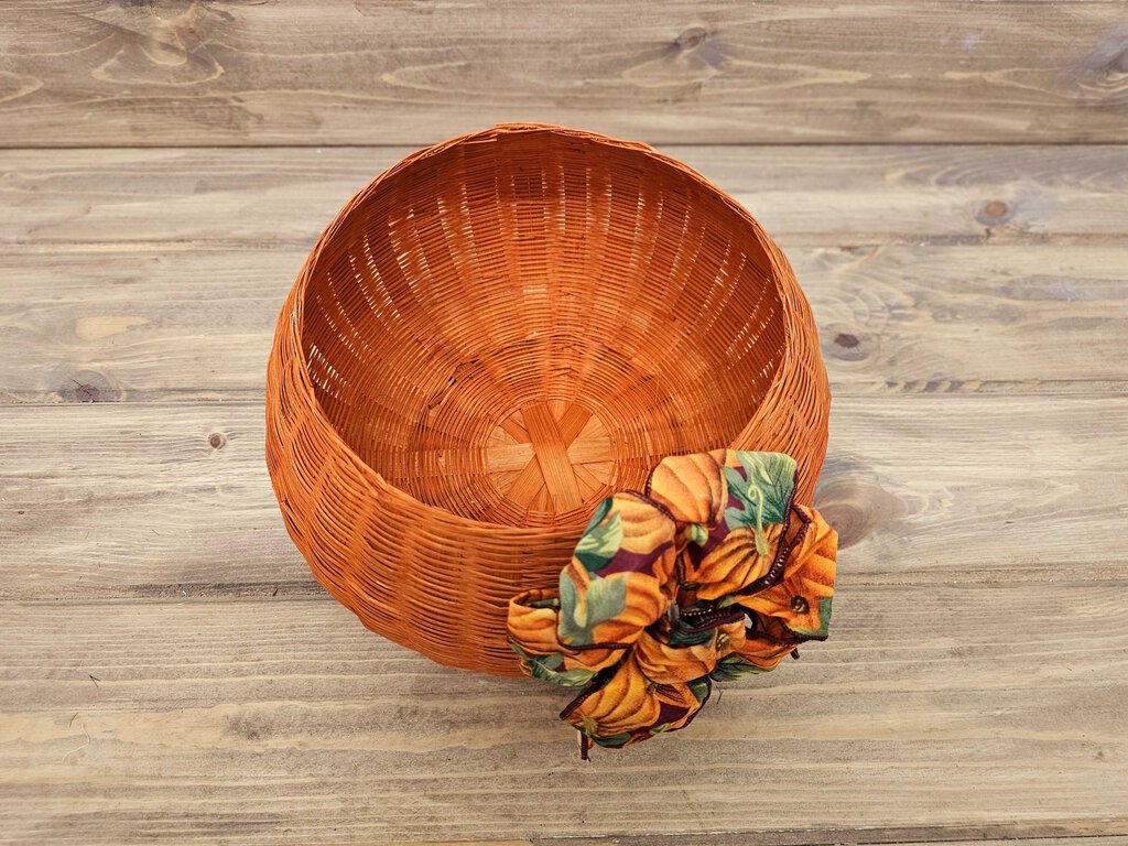 Vintage orange wicker basket w/bow