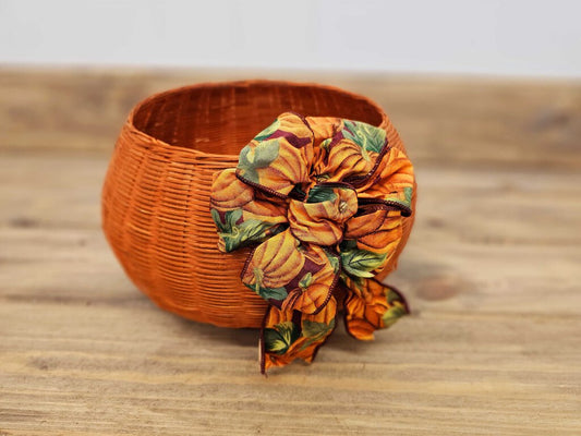 Vintage orange wicker basket w/bow