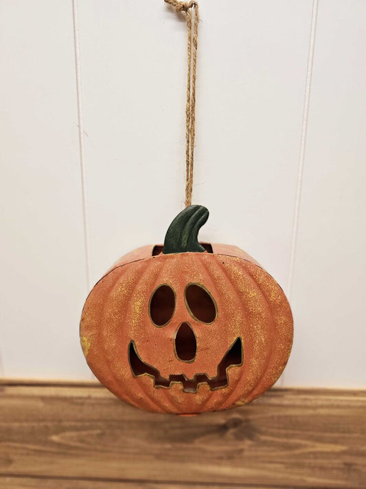 Hanging pumpkin tea light holder