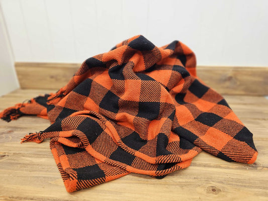 Black and orange buffalo plaid throw