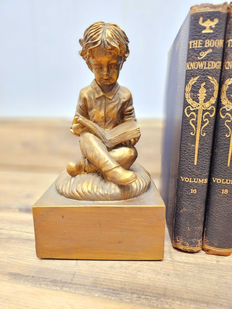 Vintage boy and girl reading bookends