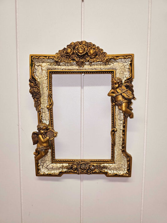 Vintage gold-toned Cupid frame